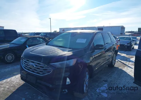 2022 Ford Edge Titanium z USA, uszkodzony, nr VIN 2FMPK4K95NBA91392